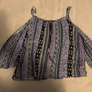 Patterned cold shoulder blouse with tassels